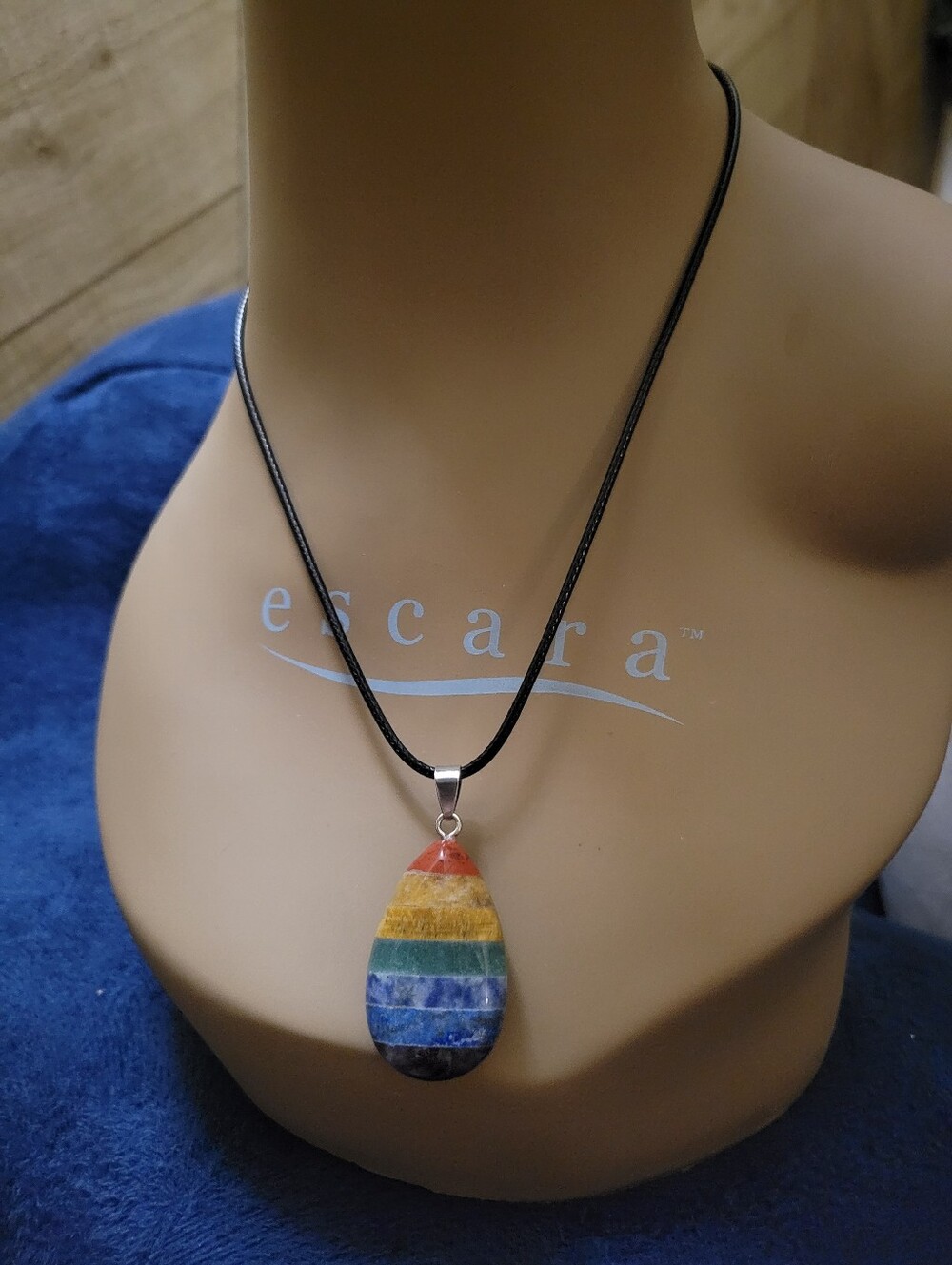 Teardrop Shaped 7 Chakra Gemstone Pendant On Black Cord Chain